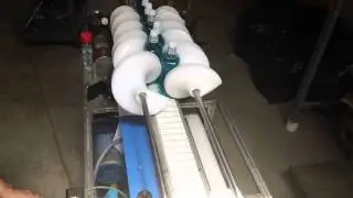 Carleton Helical Technologies - Feedscrews Turning Plastic Bottles