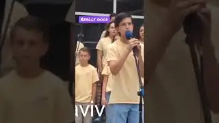 School boy sings riptide