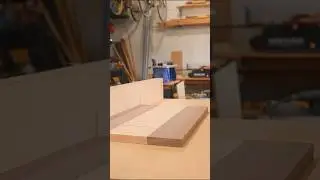Smoothing out the seams of this walnut and maple cheese board and then cutting it to size.  #maker