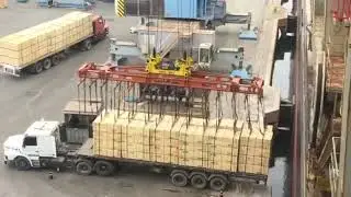 Sea Cargo terminal in the port. Loading goods onto the ship.