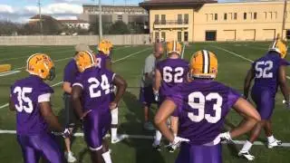 New LSU defensive coordinator Dave Aranda teaching a ball strip drill