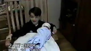 2001- Jax in hospital & about to come home for the first time. Graham singing to Jax 2/19/01-2/21/01