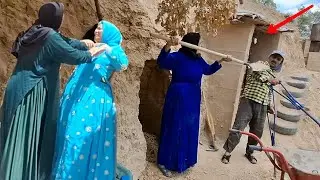The second woman's attempt to build a shelter: the first woman does not help her