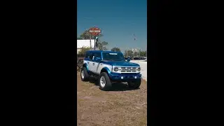 Blue Bronco mounted on awesome OFF-ROAD wheels!!