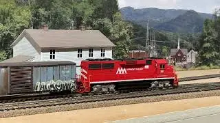 Vermont Railway GP60 381 leads a small cut of cut of cars to be switched. 
