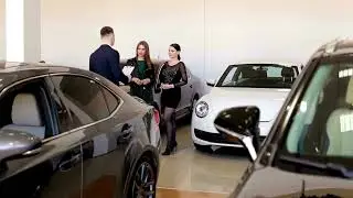 VideoVault Stock Video: Women in the car dealership buying a car