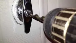 How to drill out a garage door handle lock