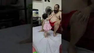 Sumo Wrestler and Baby Xavee