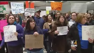 Travelers On The Travel Ban: 'Here We Go Again'