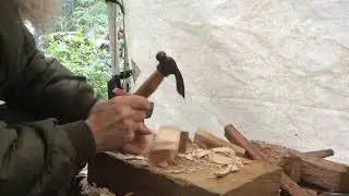 Carving a spoon with spoon adzes.