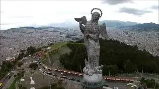 The Virgin of El Panecillo (𝘛𝘩𝘦 𝘞𝘰𝘮𝘢𝘯 𝘊𝘭𝘰𝘵𝘩𝘦𝘥 𝘸𝘪𝘵𝘩 𝘵𝘩𝘦 𝘚𝘶𝘯)