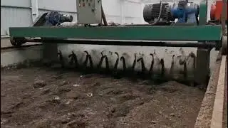 Compost turning machine working site for organic fertilizer production