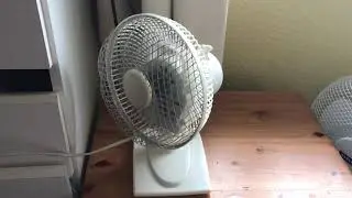 This is a 2011 Argos value oscillating 7 inch white desk fan