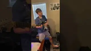 13 year-old lefty uses Vox pedal to enhance his Jimi Hendrix sound on the guitar.