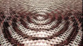 Animation of flow yellow metallic liquid with animated reflections. Loopable animation.