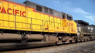 Mixed freighter with NS 4172 & UP 6288 up front & NS 4548 as a rear DPU