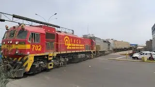 EMD JT26CW-2B #702 & EMD SD40T-2 #1024