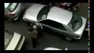 27 Dec 09 Tehran. Basiji militia destroy private property