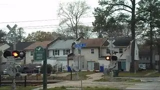 Train Goes Through Strange Operating Crossing That Malfunctions
