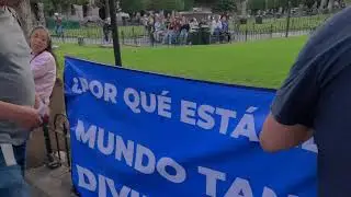 Morelia Mexico Holding large banner near crowd