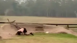 Cyclist Falls After Missing His Line on Banked Turn - 1092481