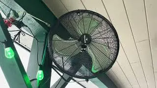 Tornado High Velocity Fan Wall Mounted Outside A Cafe 