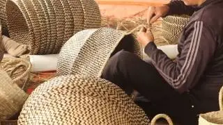 they are knitting seagrass basket