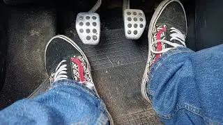 Driving car with Vans sneakers 