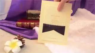 brief wedding invitation card with purple ribbon