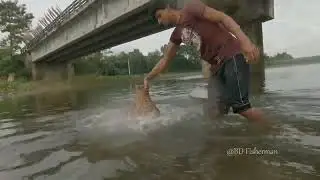Unique Fishing Idea. Traditional Village Boy Catching Fish With Polo