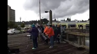 Peace Vigil with dramatic clouds at Percival Landing 20130524