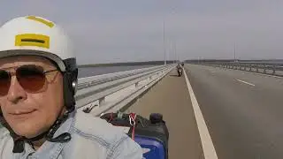 По мосту через Волгу и обратно на гибриде, малокубатурнике и электросамокате.