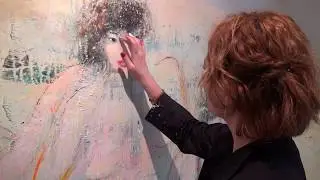 Artist Helle Louise Kierkegaard is working on her huge women painting in her studio Art-Lui