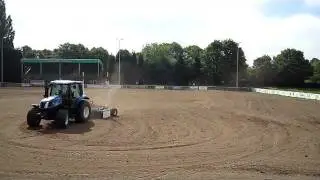 Sports Pitch Construction - Laser Grading a football pitch with our Dakota Grader..avi