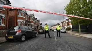 Woman shot, 6 arrested in London anti-terror raids