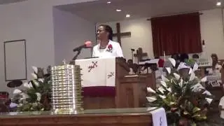 Dr. Telika McCoy preaching, 