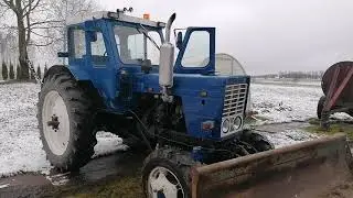 MTZ52 ar lāpstu priek&scaron;ā apskats. (krievu valodā)