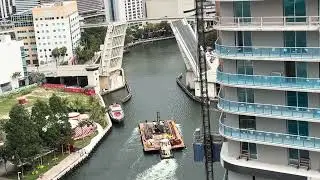 Pushboat Moving A Barge With A Crane Headed Out Of The Miami River