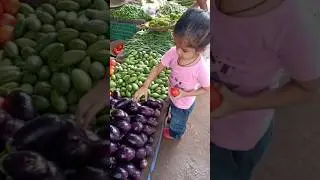 Baby buying vegetables 🍆🍅
