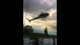 Helicopter pulling 8.2km of draw wire for 400kv line