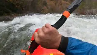 Combat roll in Table saw rapid on the Ocoee river