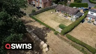 Millionaire estate owner builds wall of hay bales to avoid looking at neighbours | SWNS