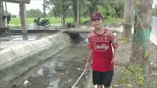 small children fishing when the river recedes !!!