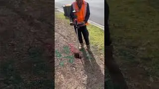 Expert Surveyor Measuring the Exact Depth and Condition of Exposed Underground Utilities ⚠️👷🚧