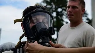 Crazy women are in latex full face gas masks and scuba diving gear dresses