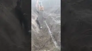 Excavation of trench for pipe restoration work