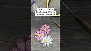Learn to make candy-striped cosmos flowers out of quilling paper - full video is pinned!