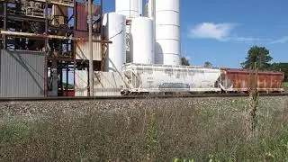 American Car & Foundry Center Flow covered hoppers on an industrial spur track in Southern Michigan