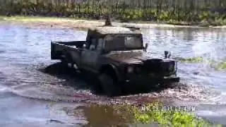 lifted jacked up bad trucks playing in the mud at the mondex.  4x4