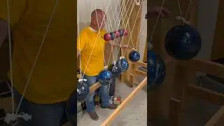 Newton&rsquo;s Cradle made of bowling balls demonstrates laws of motion #physics #science